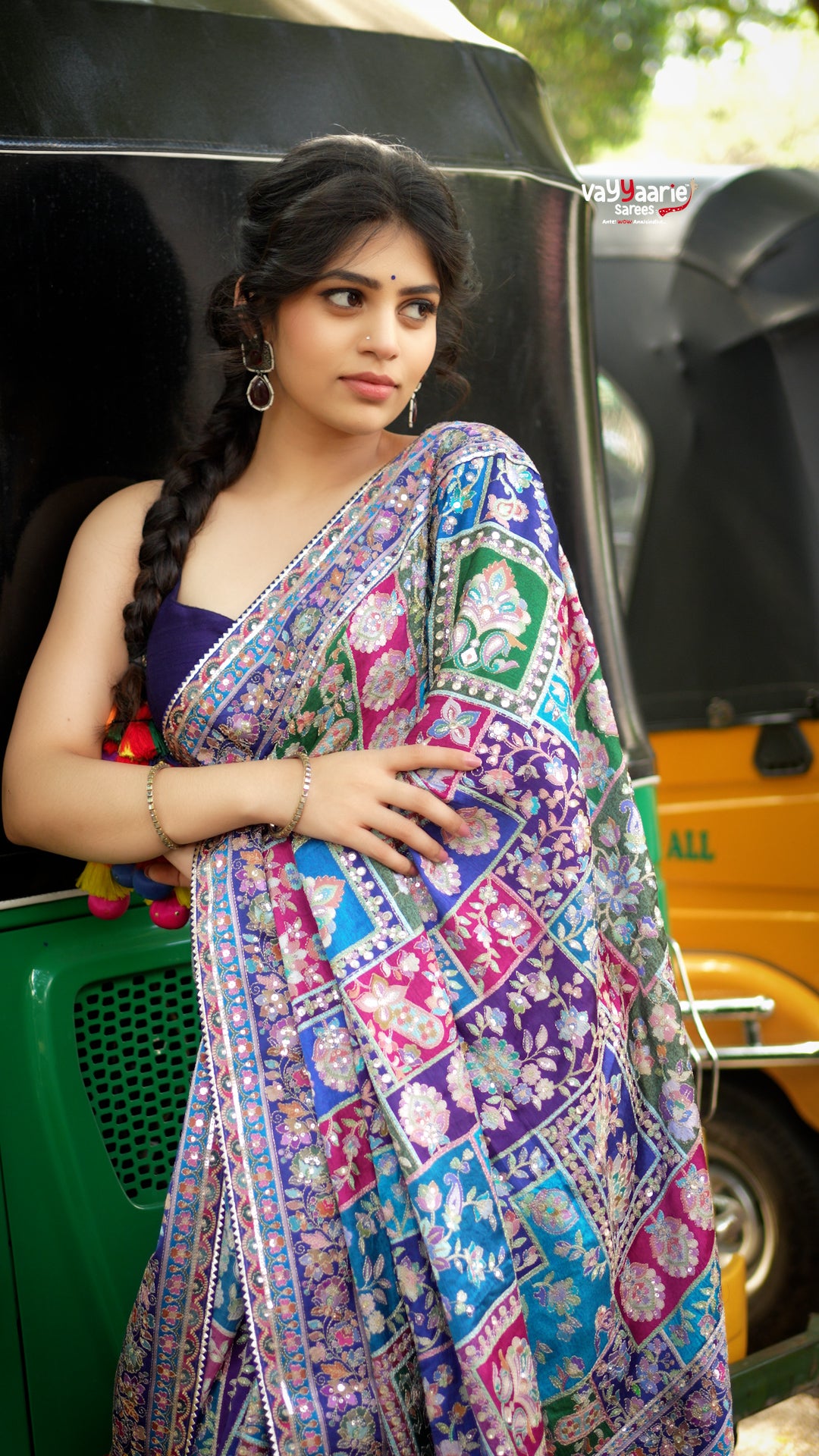 Elegant designer saree blooming with vibrant paisley charm and timeless festive vibes.